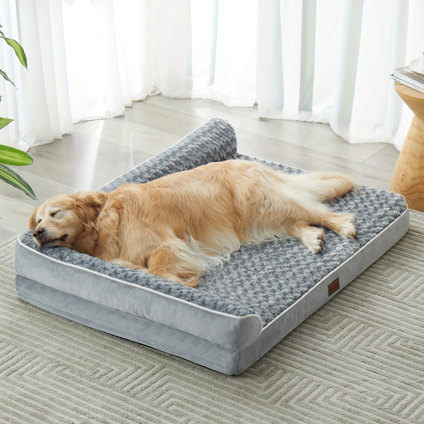 Golden retriever lying on grey breathable dog bed mat in living room