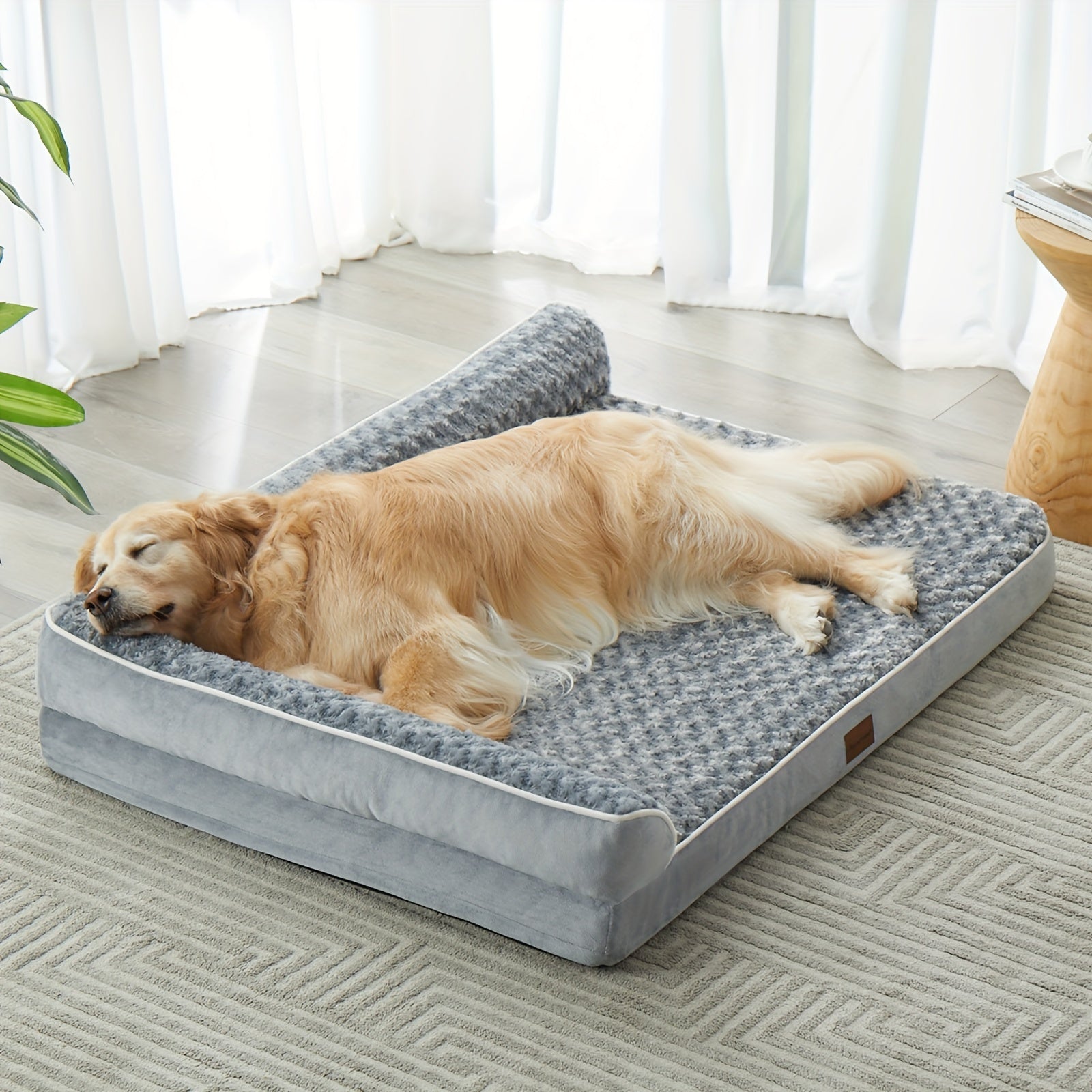 Golden retriever lying on grey breathable dog bed mat in living room