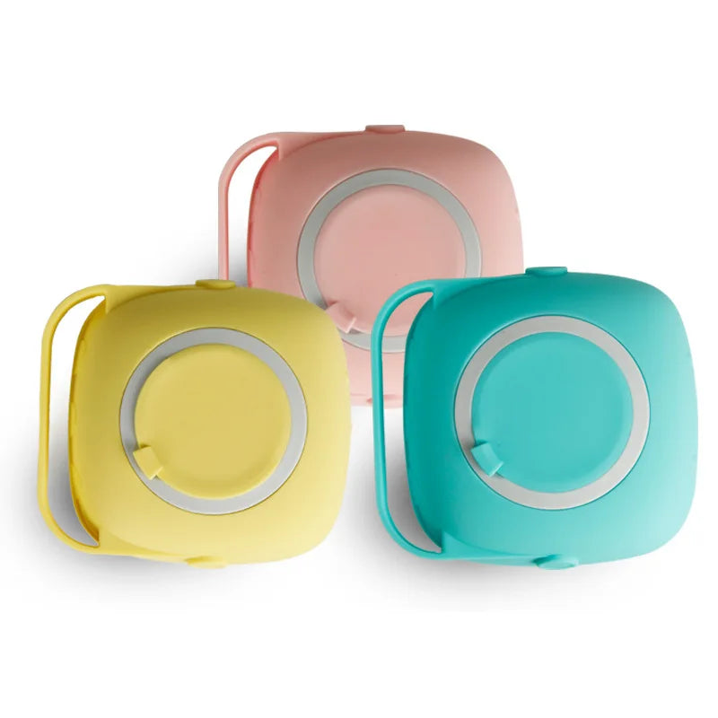 Pet grooming brush available in yellow and turquoise colors with soft silicone bristles