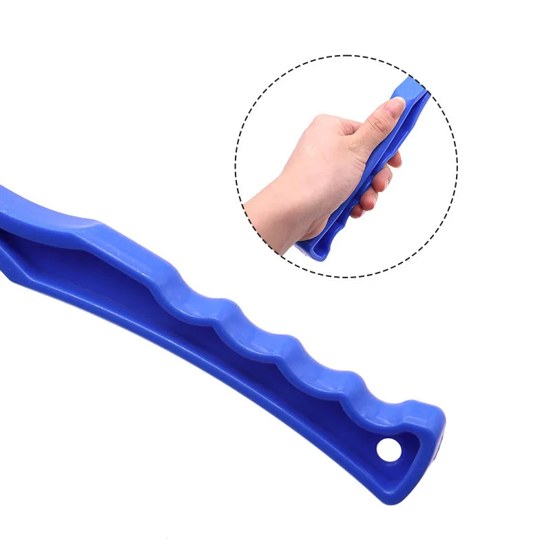 Blue plastic tool held by a hand on a white background
