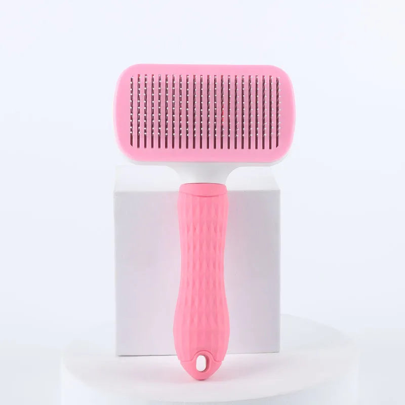 Dog grooming brush available in grey, pink, and blue color options