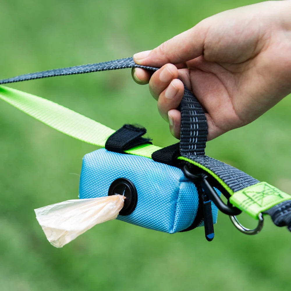 Compact dog poop bag dispenser for waste bag storage