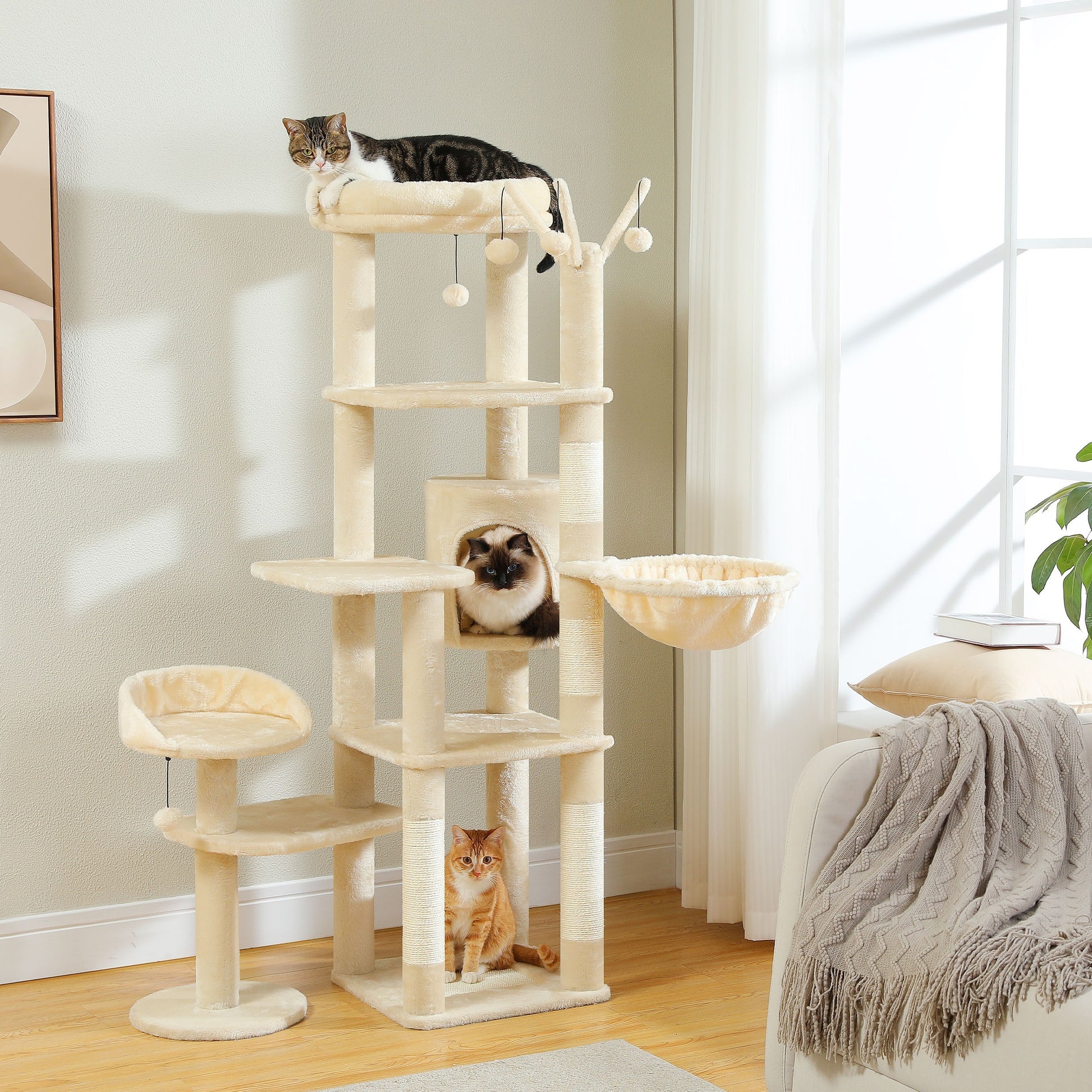 Multi-level cat tower with perches and scratching areas for indoor cats
