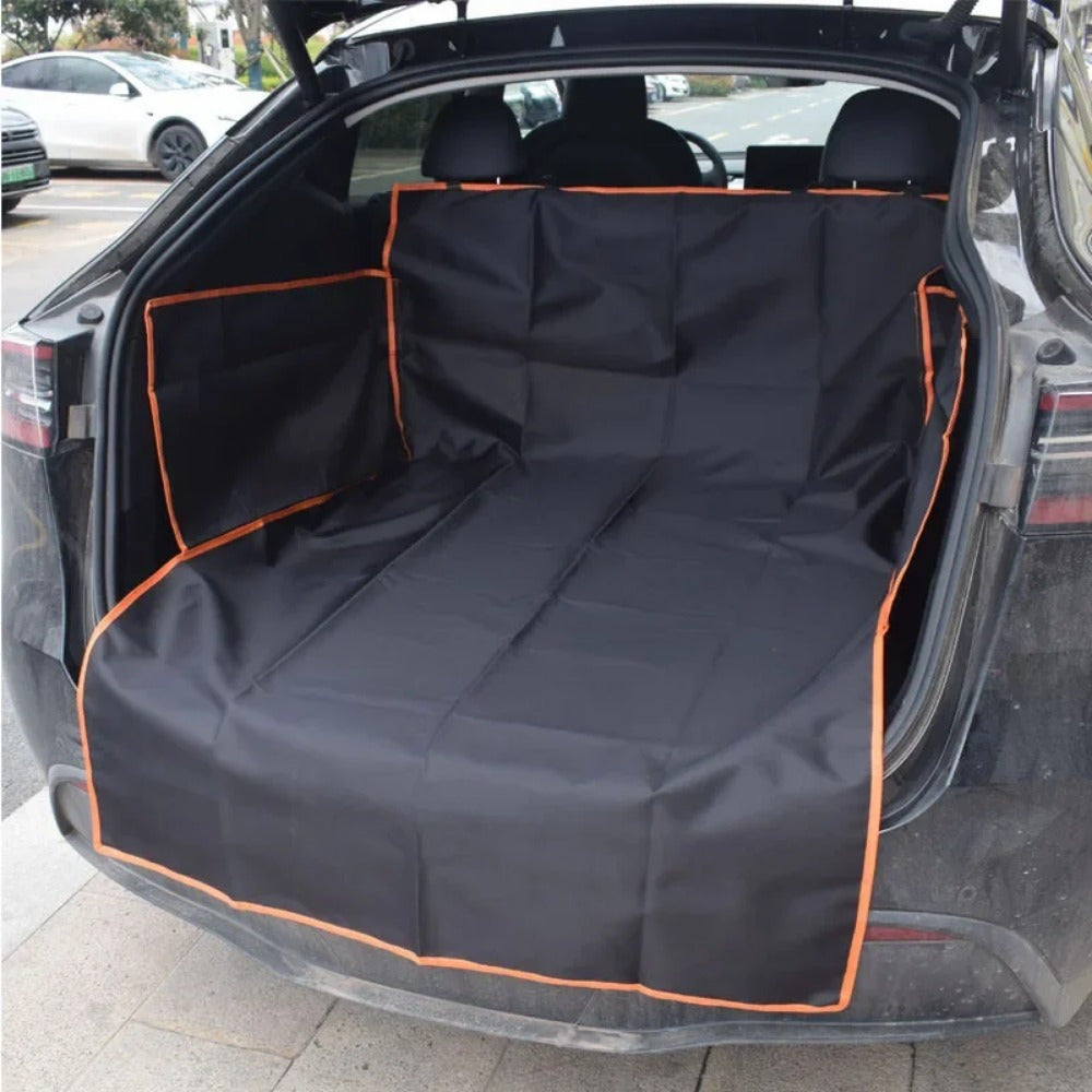Car trunk with a black and orange pet seat cover